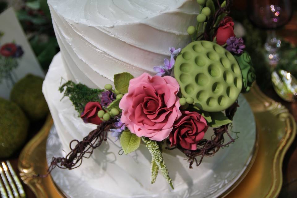 Enchanted Forest, Angled Buttercream Texture, Decorated With Handmade Sugar Flowers.