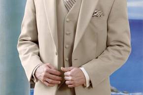 King Tux Rentals rents beach wedding tuxes, too. The Alfresco tan linen-look outfit is perfect for beach weddings!