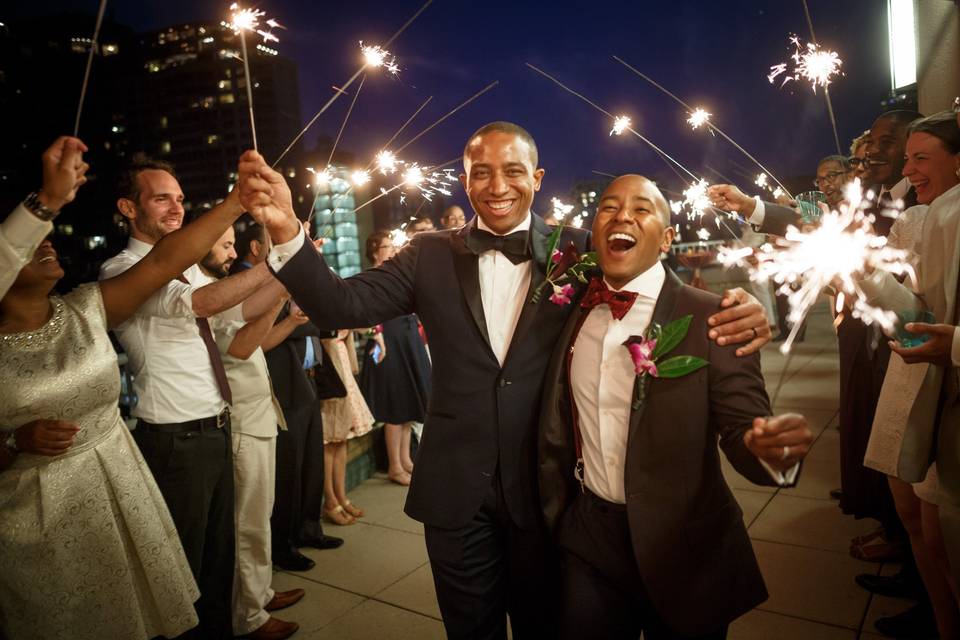 Happy couple celebrate with sparklers