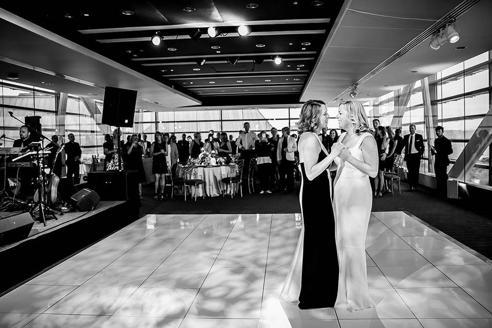 First dance romance on a shiny white acrylic dance floor.