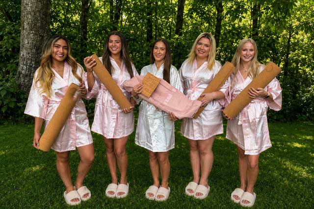 Bridal party in satin robes an