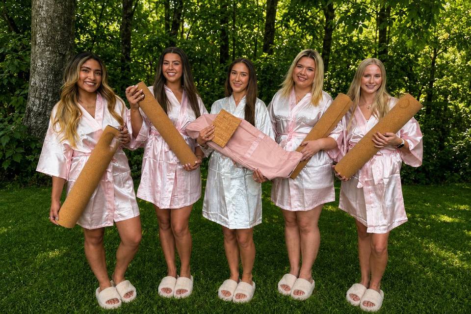 Bridal party in satin robes an