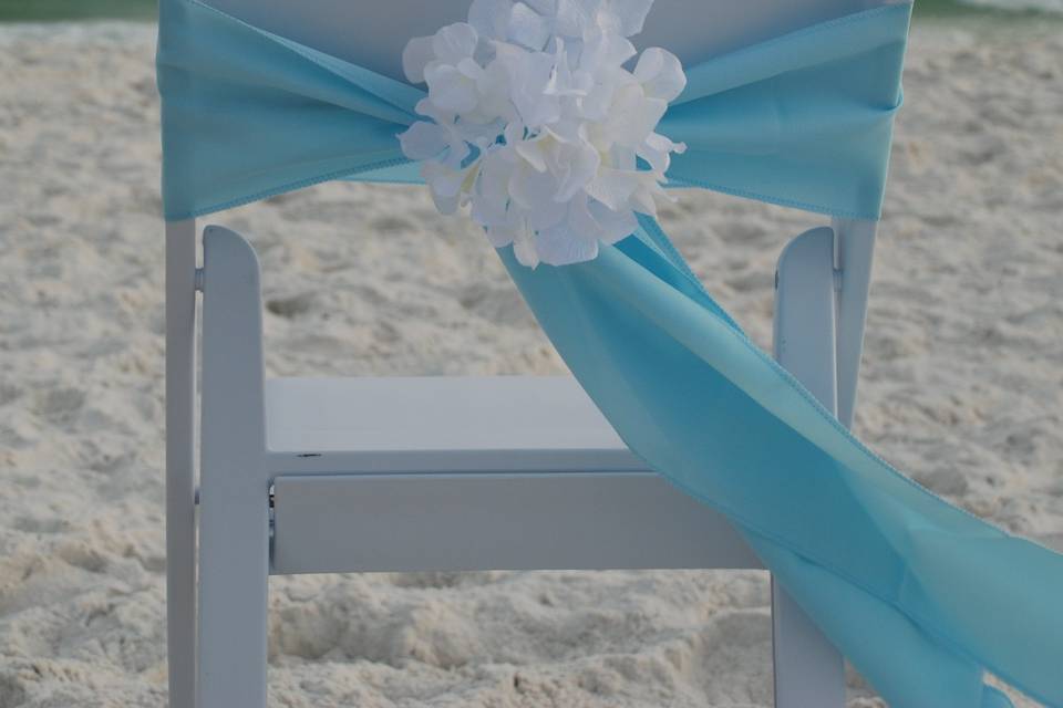 Blue sash w/white flower