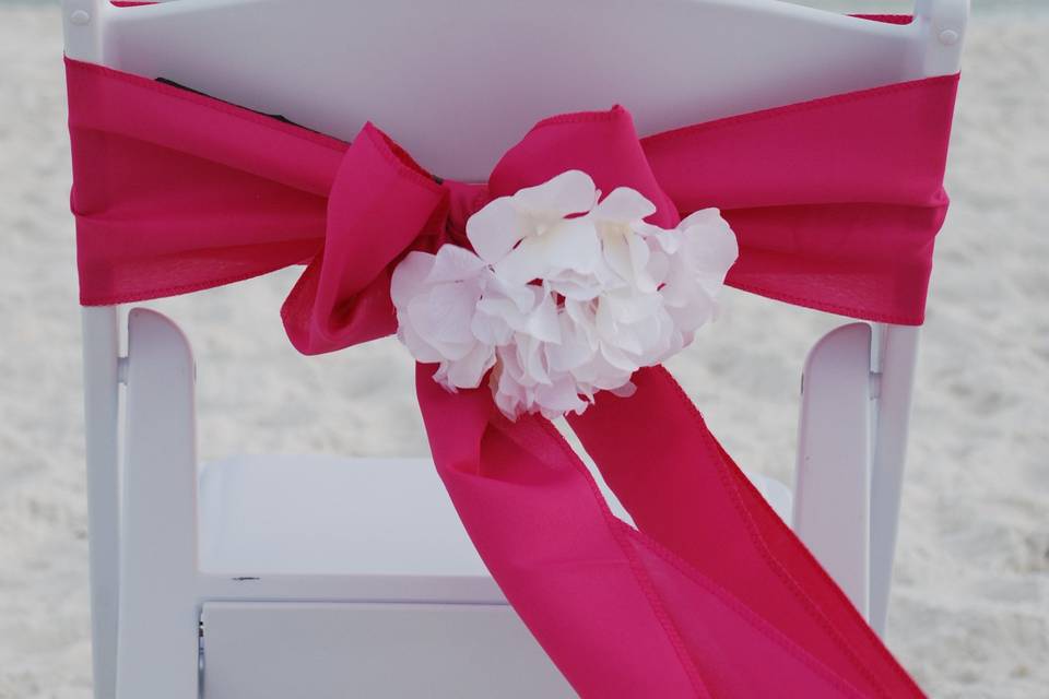 Hot pink sash with white flower