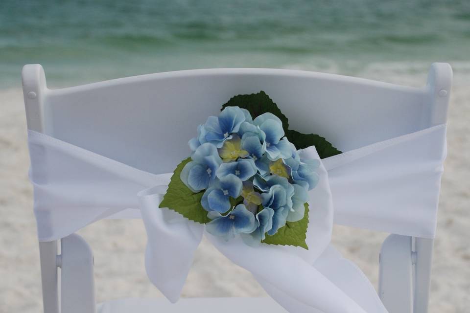 White sash with blue flower