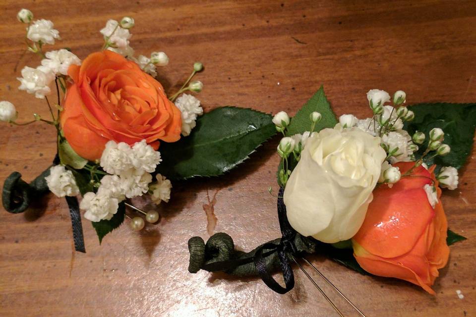 Coral and ivory boutonniere