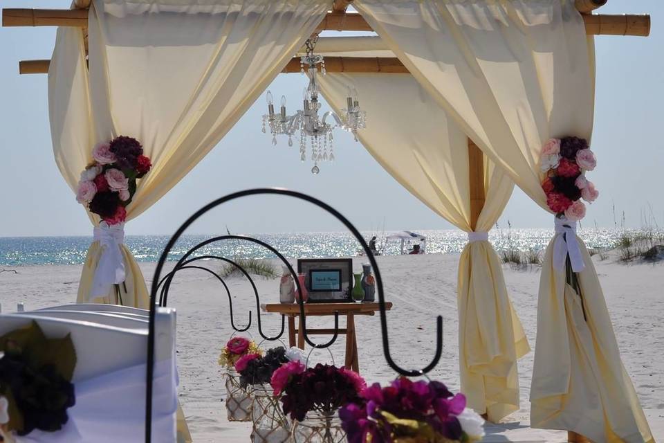White set up with pink flowers and special swags and lanterns, destin, fl