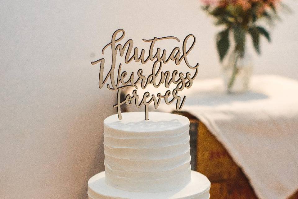Textured cake with text topper