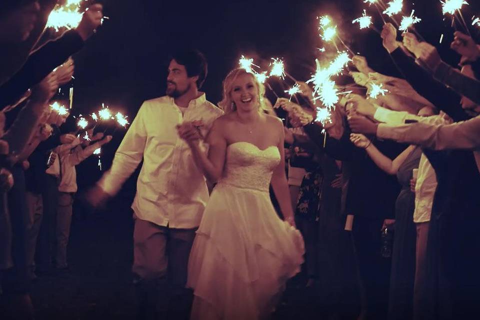 Newlywed couple sparkler exit