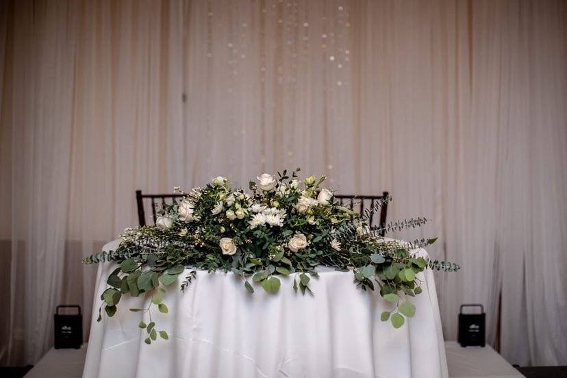 Sweetheart table lush decor