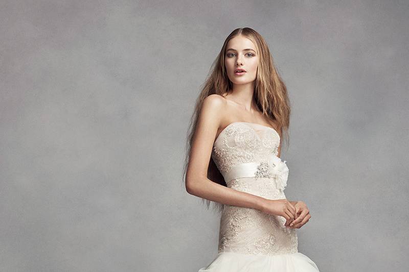 White by Vera Wang Style	VW351346	Crepe sheath gown with halter neckline, low keyhole back with buttoned band, and beaded lace appliqués. Sweep train.