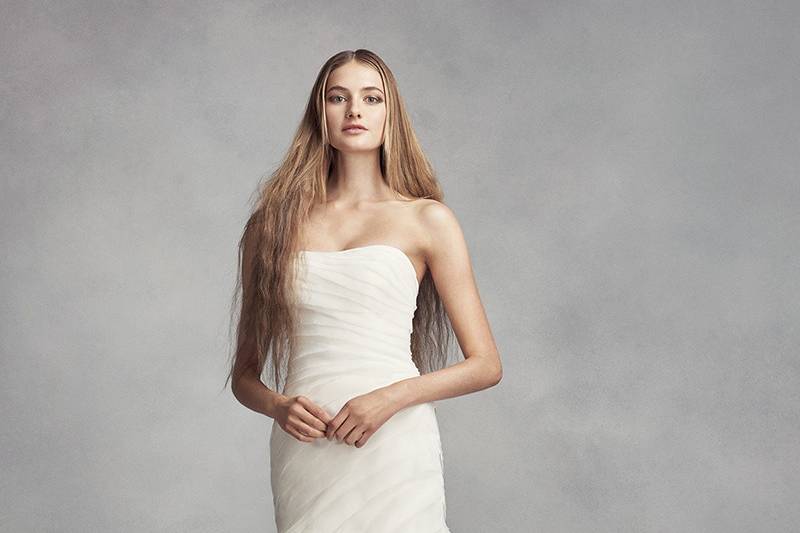 White by Vera Wang Style	VW351369	Lace sheath gown with plunging illusion V-neckline, spaghetti straps, pearl embellished appliqués, and tulle skirt. Chapel train.