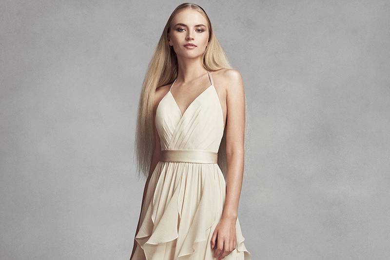 White by Vera Wang Style VW360348	<br>A sleek dress for modern 'maids, this high-neck bridesmaid dress from White by Vera Wang is adorned with cascading ruffles at the low-dipped back. A satin sash finishes the look.