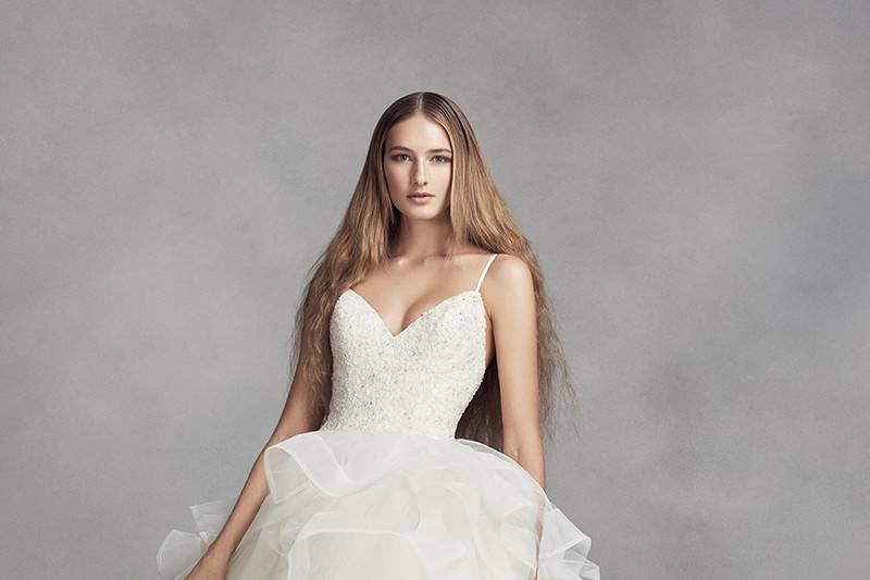 White by Vera Wang Style VW351371 SS	<br>	Organza ball gown with V-neckline, spaghetti straps, beaded lace bodice, and ruffled skirt. Chapel train.
