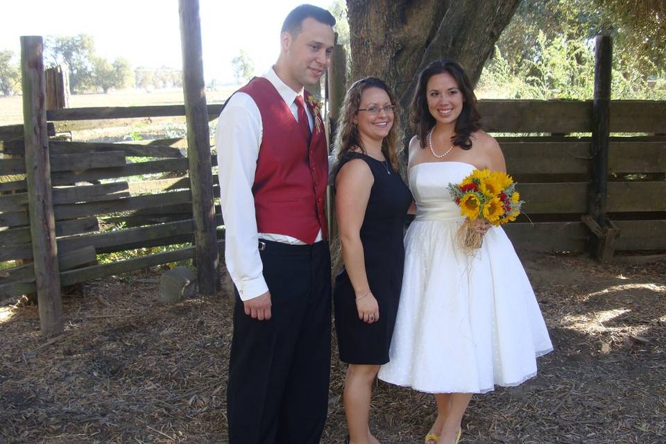 Groom, officiant, and bride
