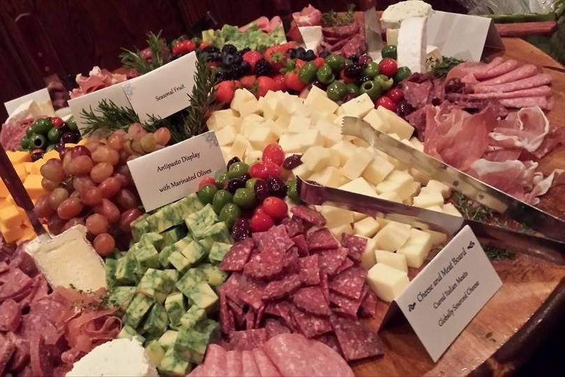 Reception? How about our amazing antipasto display!Cured Italian Meats, Globally Sourced Cheese, Domestic Selections, Marinated Olives, Grilled Vegetables, Seasonal Fruit and Berries, Artisan Crackers