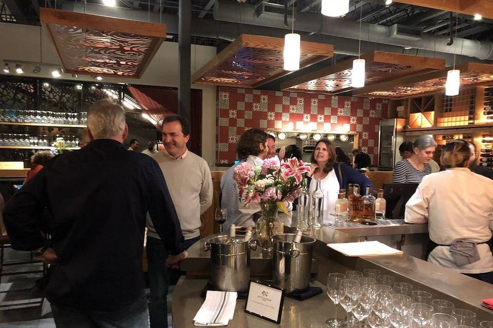 Six food stations set up throughout Sabio for a charity event.
