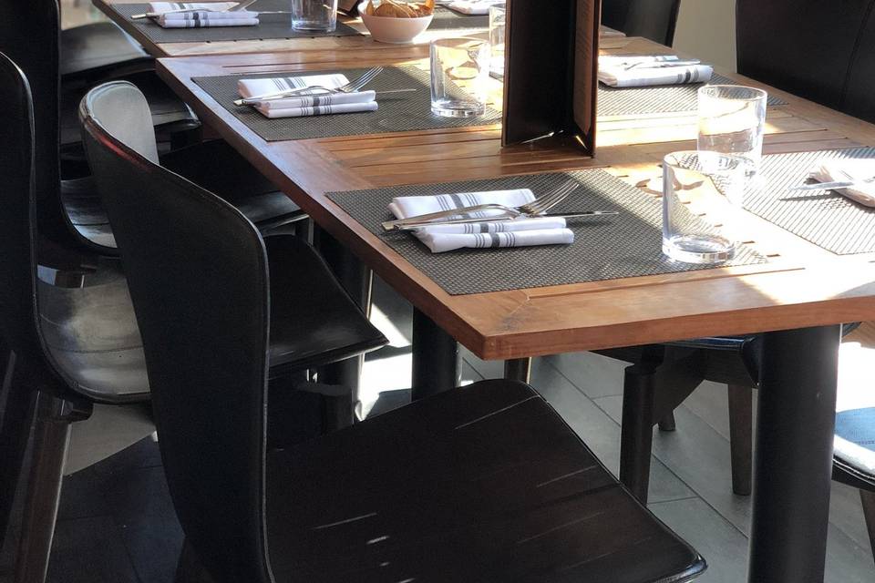 Custom menus for the party - tables set for a seated Saturday brunch