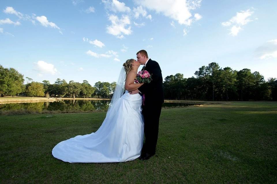 Newlyweds kissing