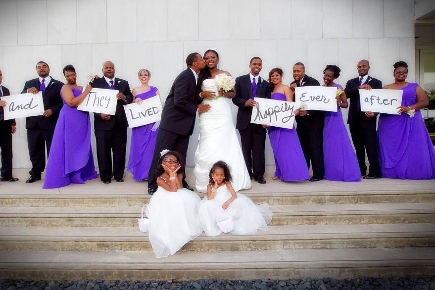 Couple with bridesmaids, groomsmen and flower girls