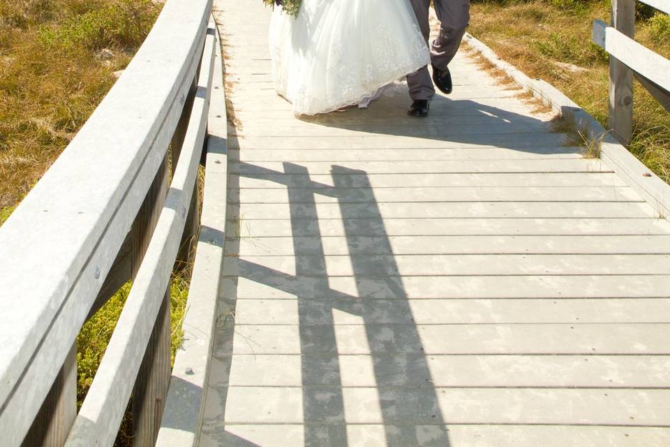 Couple strolls along boardwalk
