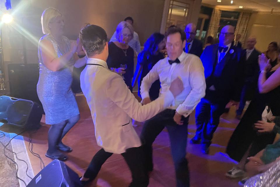 Grooms dance at reception