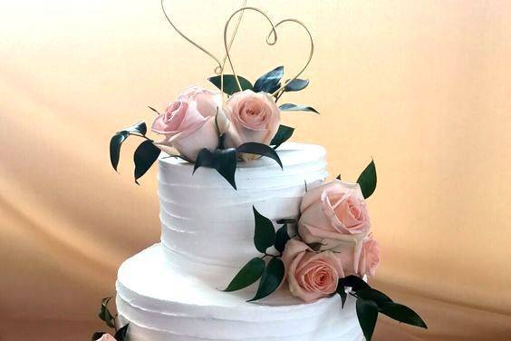 Textured cake with pink flowers