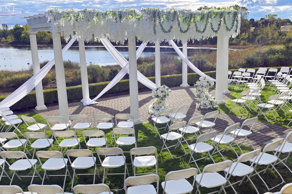 Ceremony flowers drapes
