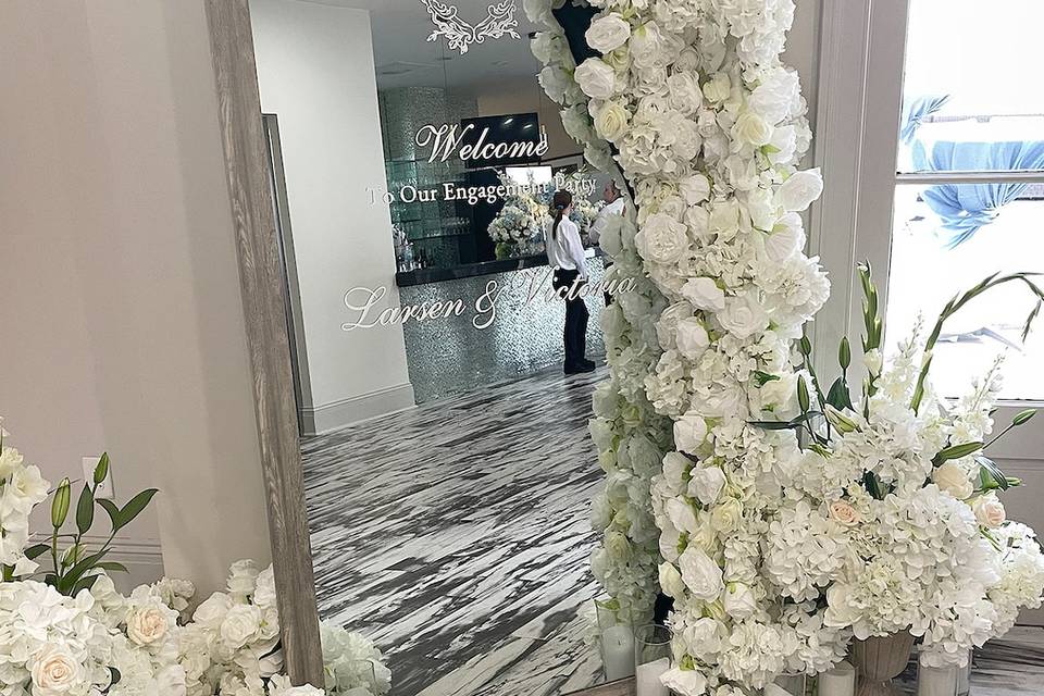 White rose garlands on mirrors