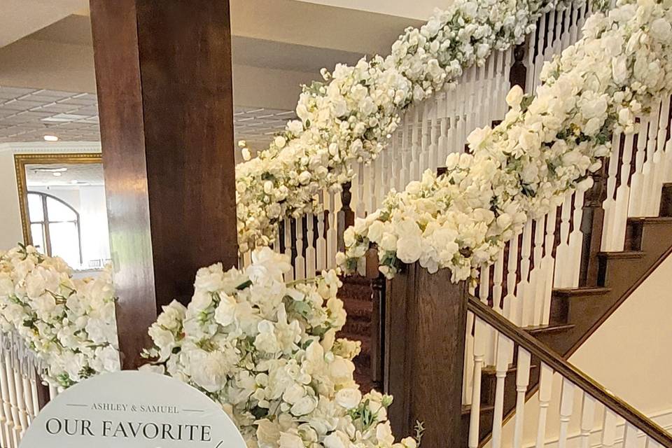 White green garlands on stairs