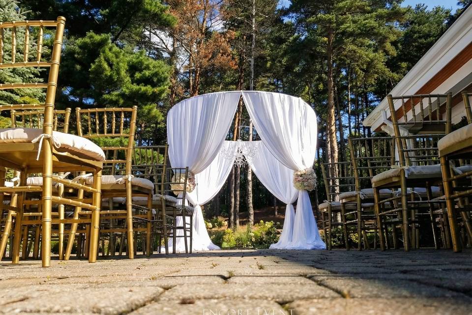 Outside ceremony chuppa drape