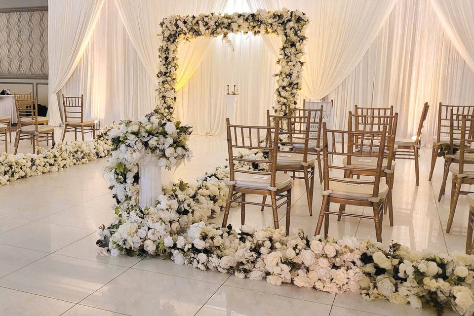 Ceremony drape, arch, garlands