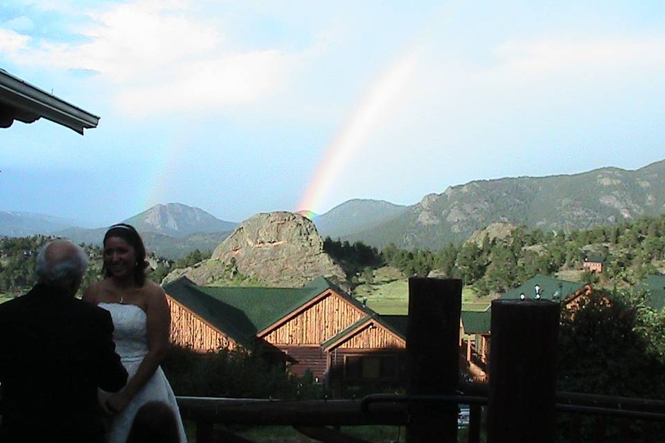 A Sharp Dj Service with a rainbow after the ceremony at Mary's Lake Lodge in Estes park.