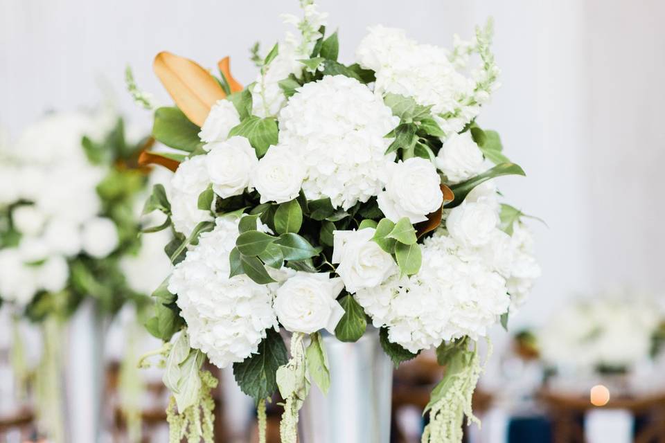 Table setting with floral centerpieces