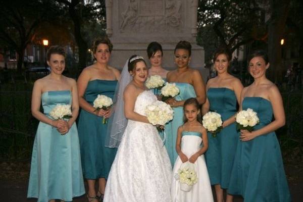 The bride with her bridesmaids and flower girl