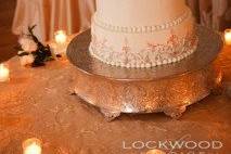 Kate Ryan Linens Champagne Taffeta Tablecloths with Champagne Crushed Taffeta Table Runners, Ivory Classic Napkins & Champagne Crystal Organza Sashes. Photography by:Aaron Lockwood