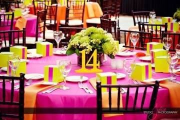 Kate Ryan Linens Fuchsia Classic Tablecloths with Classic Orange Napkins..Chiavari's: Eventfully Yours Rentals, Event Design: Swankey Events, Photography: Studio Julie, Venue: Hemingway House in Key West, Florida