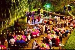 Kate Ryan Linens Fuchsia Classic & Orange Satin Tablecloths with Classic Orange Napkins..Chiavari's: Eventfully Yours Rentals, Event Design: Swankey Events, Photography: Studio Julie, Venue: Hemingway House in Key West, Florida