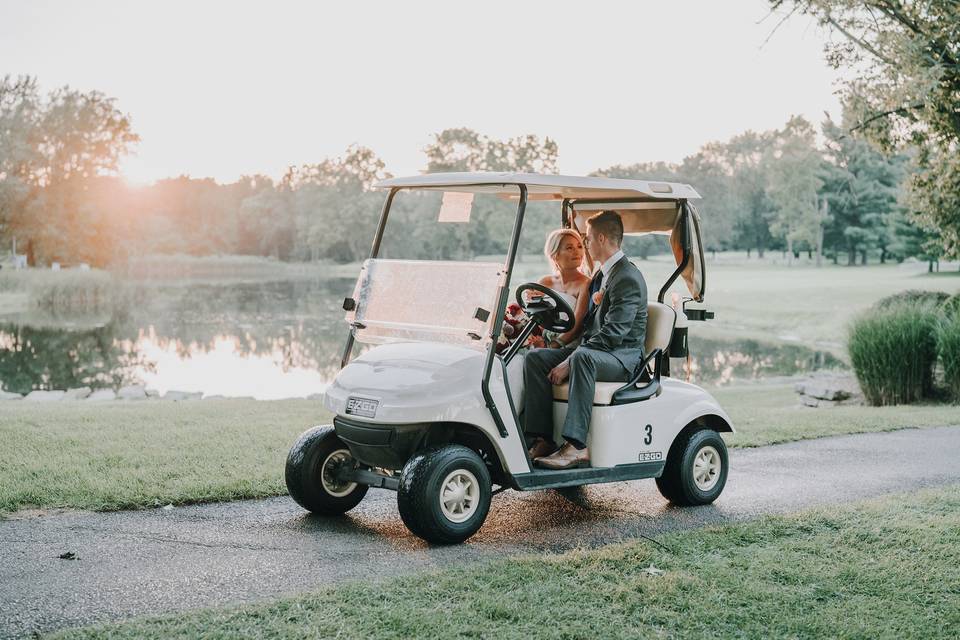 Couple at golf car