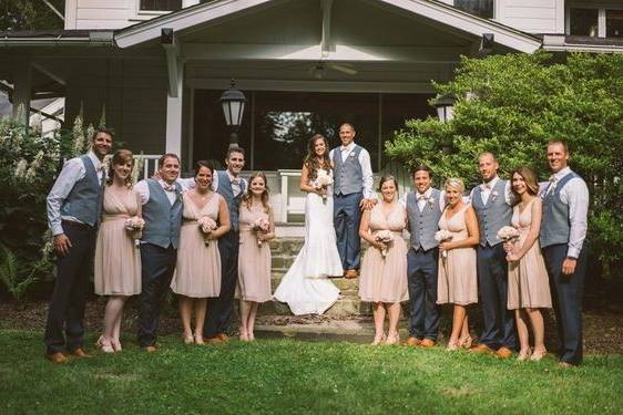 Newlyweds and guests outside the venue