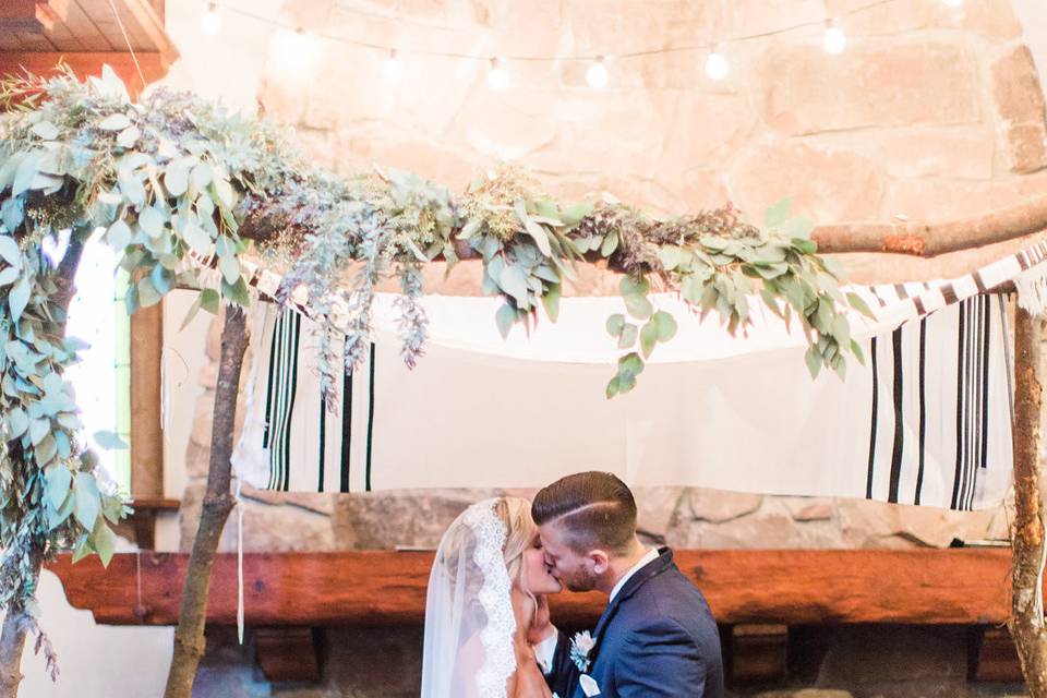 Kiss by the fireplace