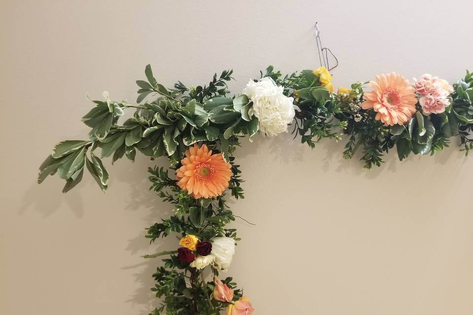 Floral backdrop detail.