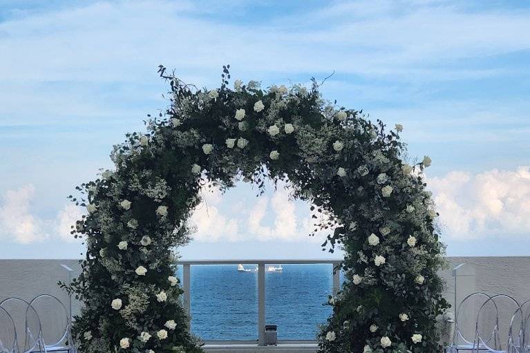 Whimsical garden arch with hed