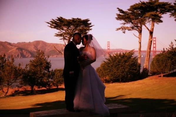 Lovely couple in front of the Golden Gate Bridge.