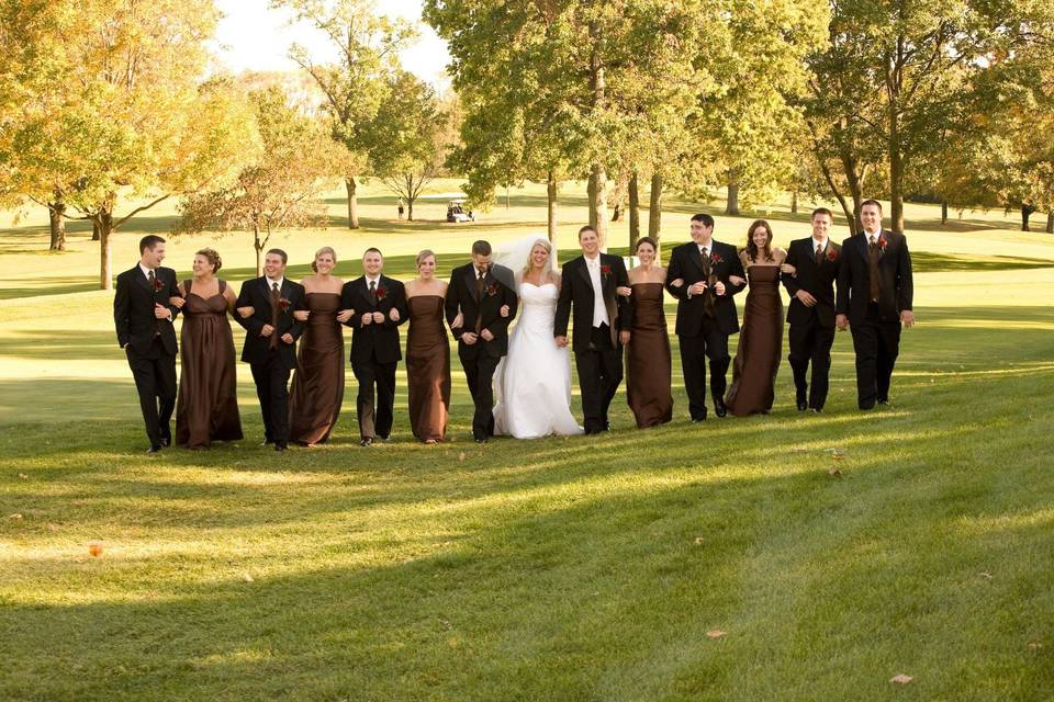 The couple with the bridesmaids and groomsmen