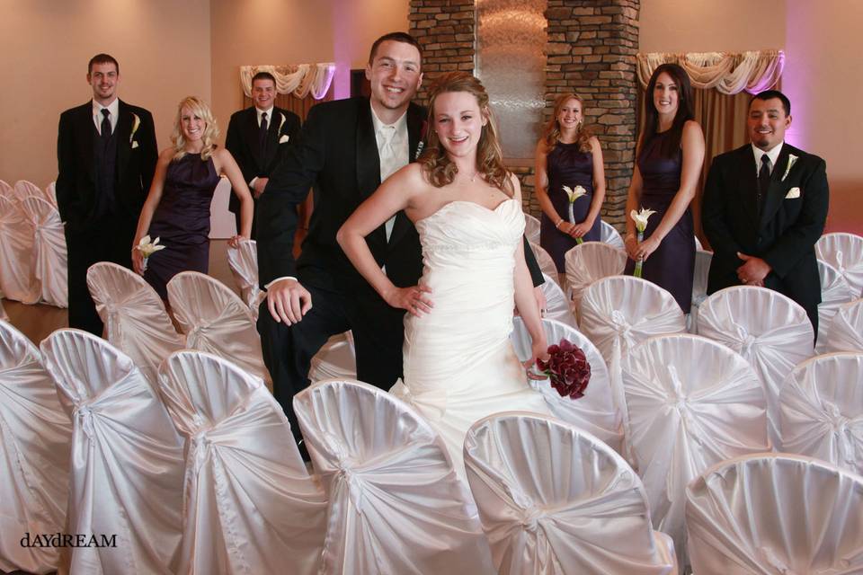 The couple with their bridesmaids and groomsmen