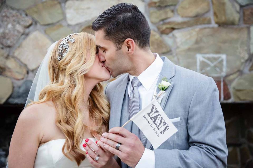 Bride and groom kissing