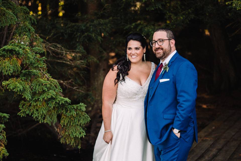 Bride and groom by the trees