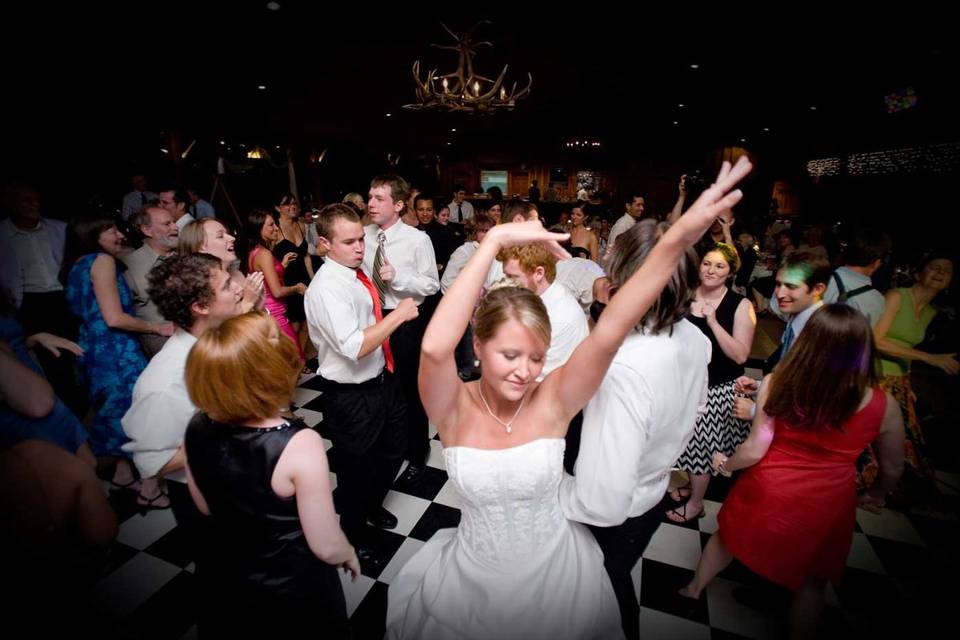 Bride partying with the crowd