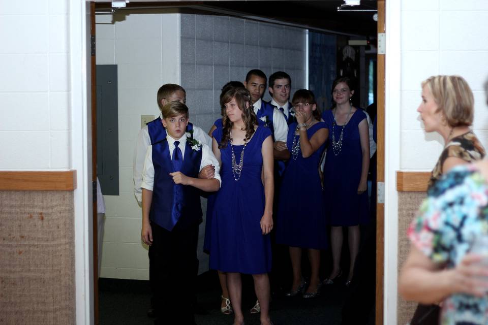 The bridesmaids and groomsmen